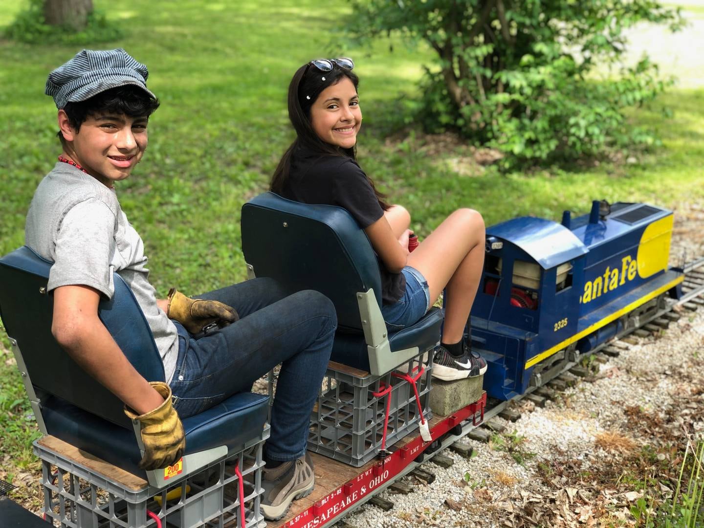 George Werderich and his sister Anita L. Werderich riding their 7.5 gauge train on the Prairie State Railroad in Plowman's Park. (photo provided)