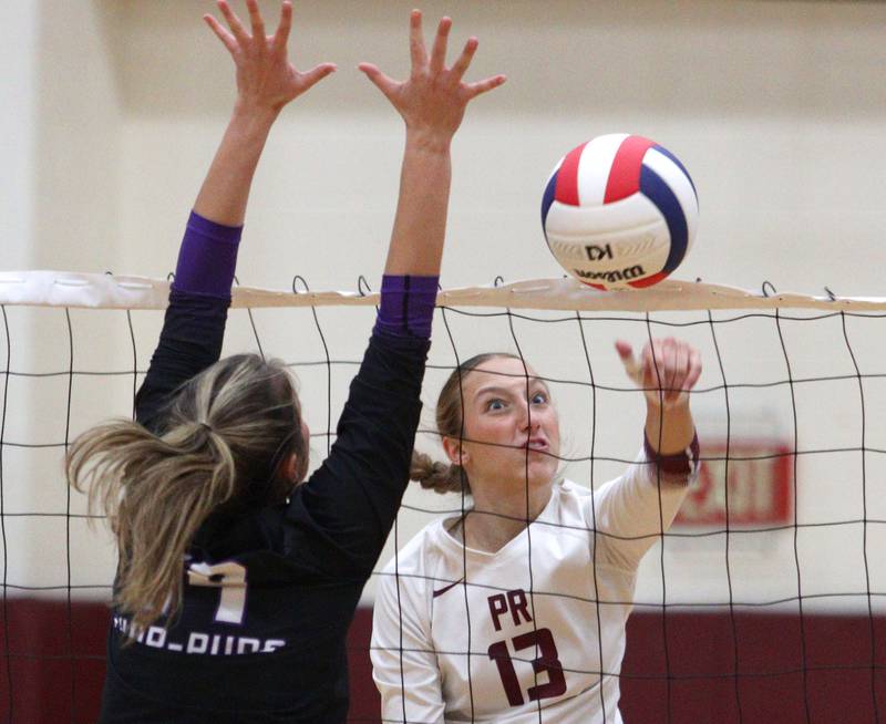 Prairie Ridge’s Abigail Smith sends the ball over the net against Hampshire during varsity volleyball on Thursday, Oct. 3, 2024, at Prairie Ridge High School in Crystal Lake.