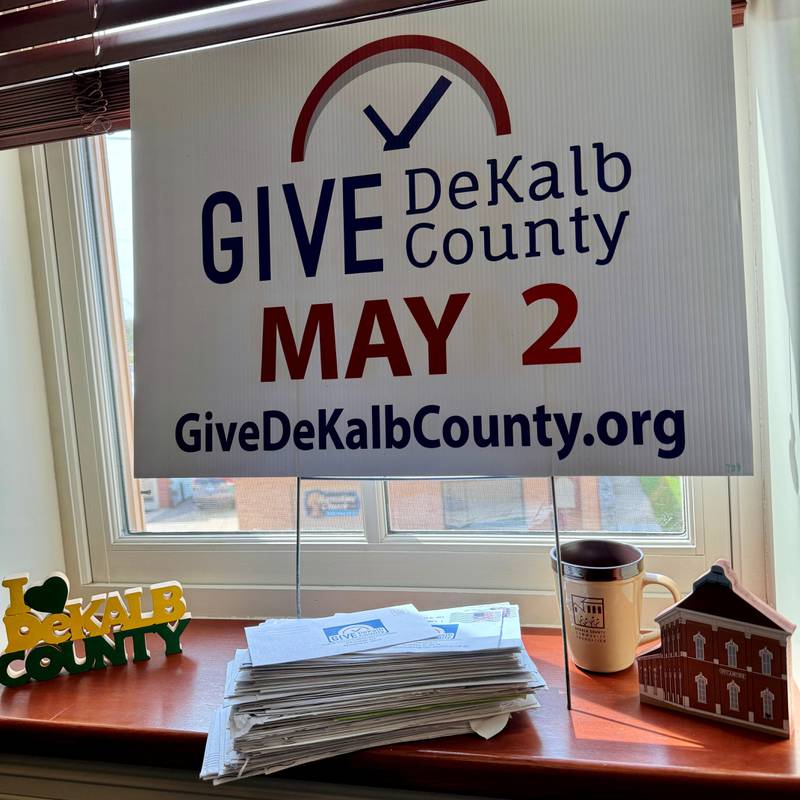 A stack of envelopes filled with donations for Give DeKalb County 2024 sit on a windowsill in DeKalb County Community Foundation on April 23, 2024.