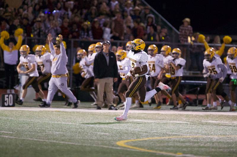 Jacob's Antonio Brown runs the ball for a touchdown against Huntley on Friday, Sept. 23,2022 in Huntley.