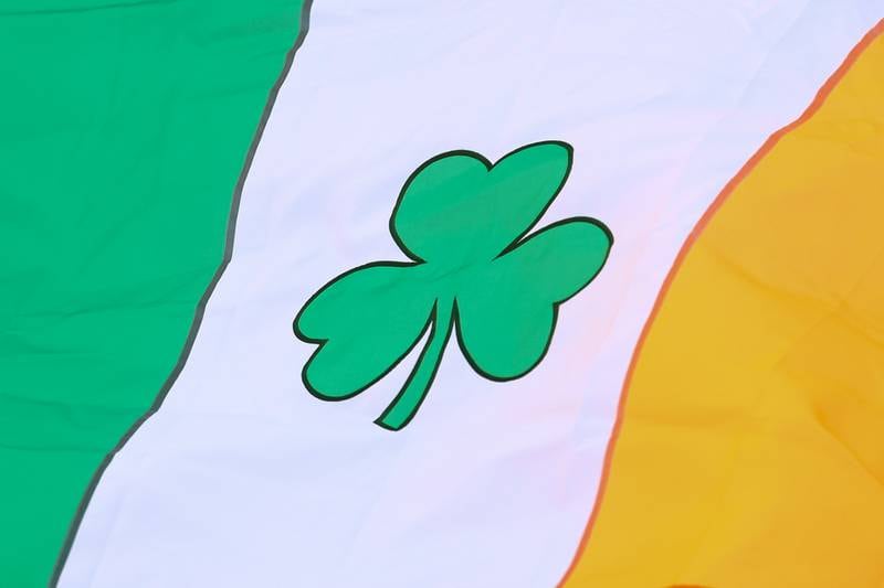 An Irish flag blows in the wind at the annual Plainfield Hometown Irish Parade on Sunday, March 15, 2026 in Plainfield.
