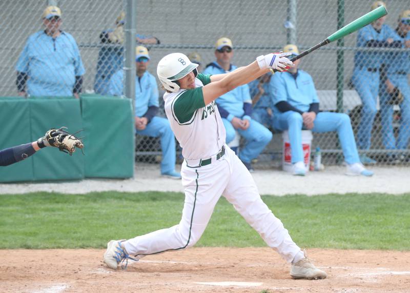 St. Bede's Beau Thompson swings and misses at a pitch from Marquette on Monday, April 22, 2024 at St. Bede Academy.