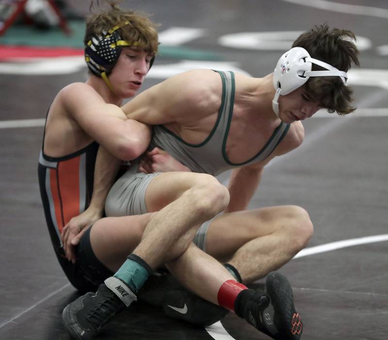 McHenry’s Pedro Jimenez wrestles Stevenson’s Lorenzo Frezza at 126-pounds during the IHSA 3A Individual Sectional wrestling meet at Barrington High School Saturday February 12, 2022.