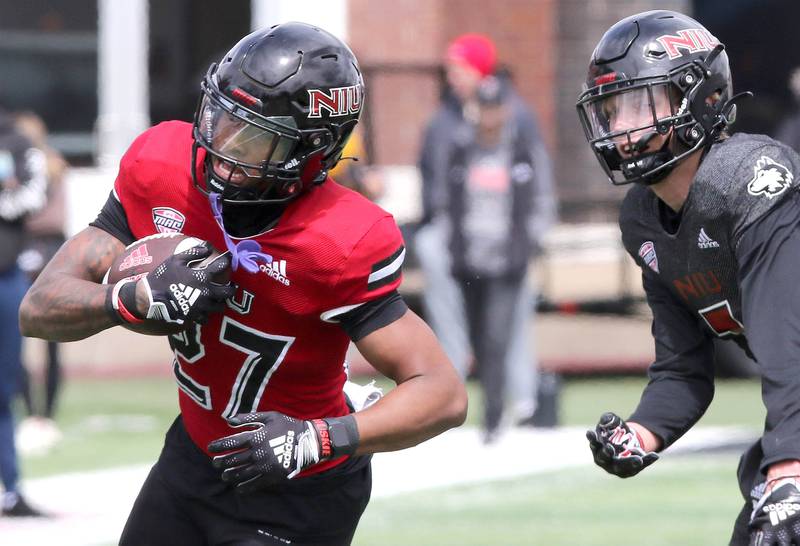 Northern Illinois wide receiver Keyshaun Pipkin runs ahead of Jordan Hansen during the Spring Showcase Saturday, April 22, 2023, at Huskie Stadium at NIU in DeKalb.