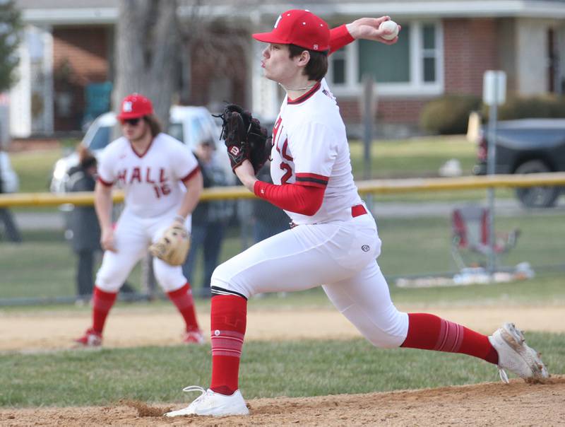 Hall's Ashton Peacher delivers a pitch to St. Bede on Monday, March 27, 2023 at Kirby Park in Spring Valley.