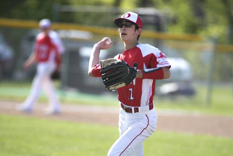 Oregon’s Anthony Bower throws to first for an out against Dixon.
