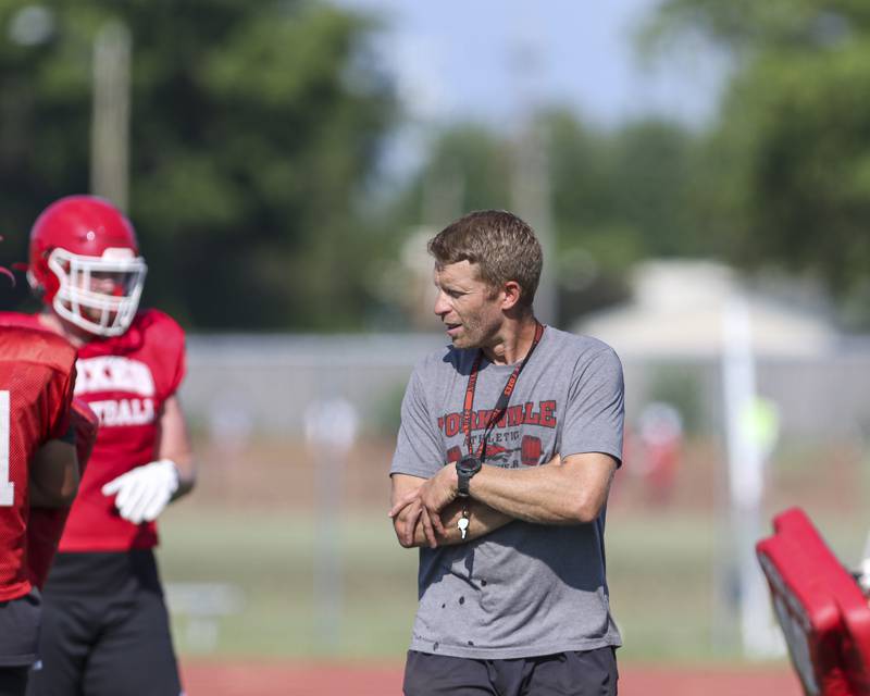 Yorkville head coach Dan McGuire coaches on the field at Yorkville High School football practice, Monday, Aug 13, 2025 in Yorkville.