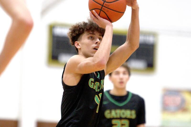 Crystal Lake South’s AJ Demirov takes a free throw against Lake Zurich in Hinkle Holiday Classic boys basketball tournament game action at Jacobs High School Wednesday.