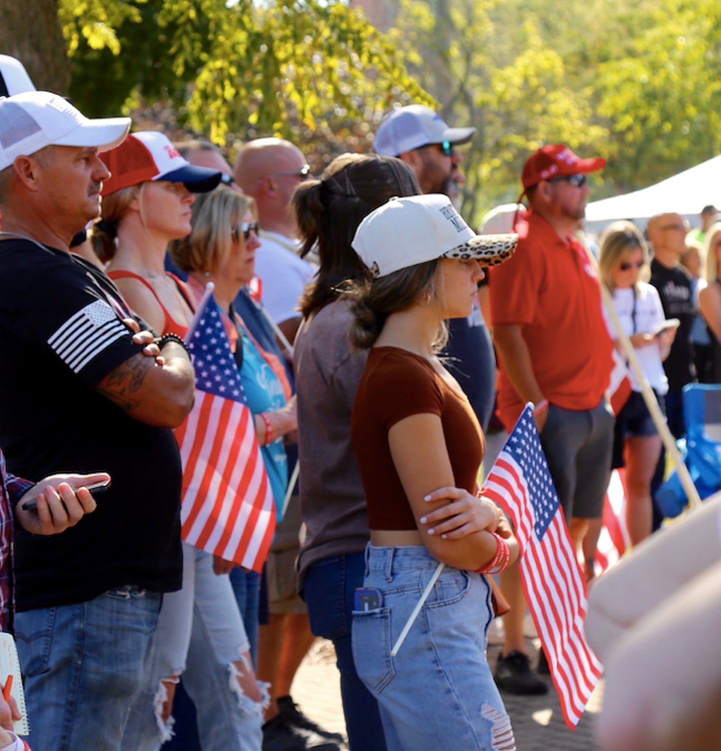 People gather at a Charlie Kirk memorial in Riverfront Park in downtown Yorkville on Sept. 27, 2025.