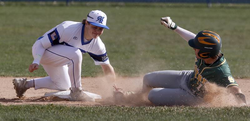Burlington Central's Zane Pollack tags out Crystal Lake South's Dayton Murphy as he tries to take second base during a Fox Valley Conference baseball game on Friday, April 12, 2024, at Burlington Central High School.