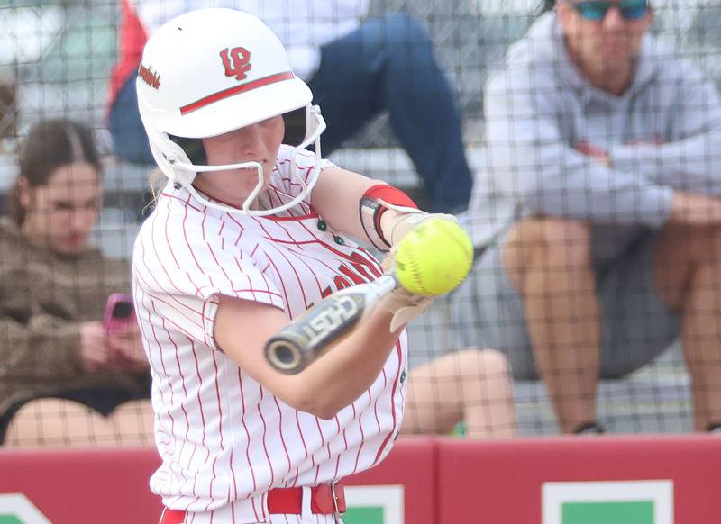 L-P's Maggie Boudreau makes contact with the ball against Morton on Friday, March 20, 2026 at the L-P Athletic Complex in La Salle.