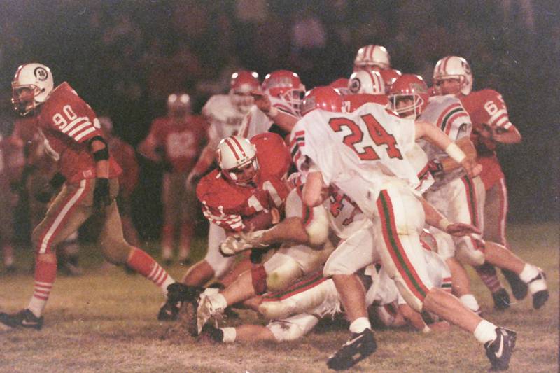 Ottawa's Kyle Windy is tackled by a host of La Salle-Peru defenders on Friday, Oct. 23, 1992 at King Field in Ottawa.