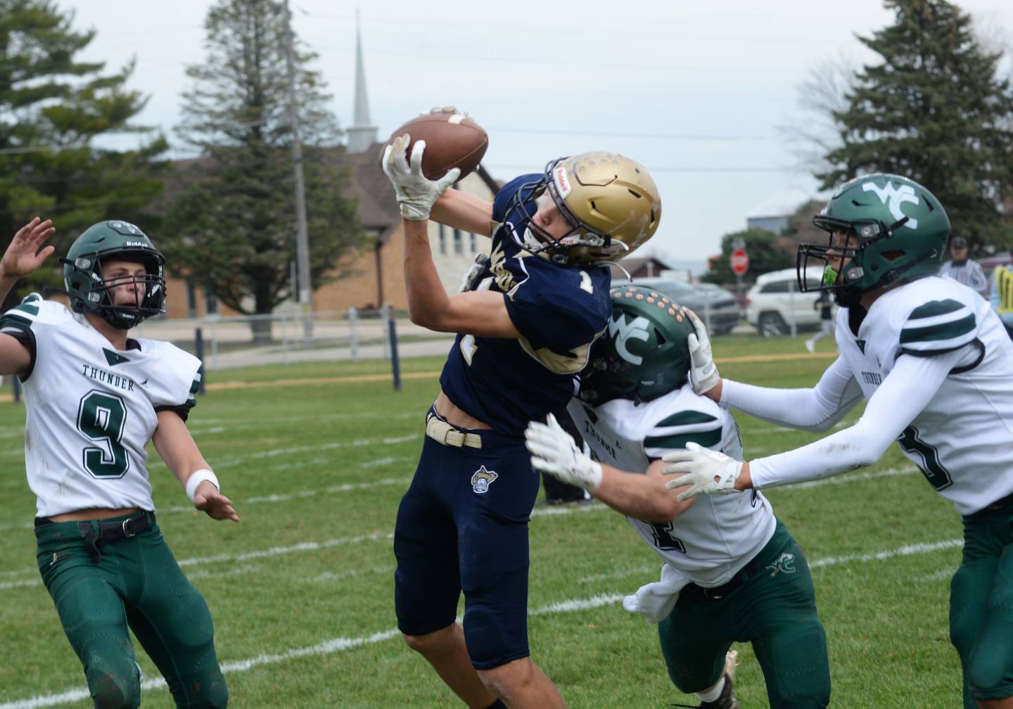 Polo's Mercer Mumford (1) catches a pass for a gain against West Carroll during 8-man football playoff action on Saturday, Nov. 9, 2024 at Polo High School.