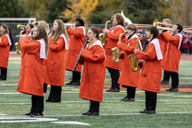 Lincoln-Way West’s marching band performs the National Anthem prior to a 7A varsity football playoff game against Kenwood at Lincoln-Way West on Nov. 8, 2025.