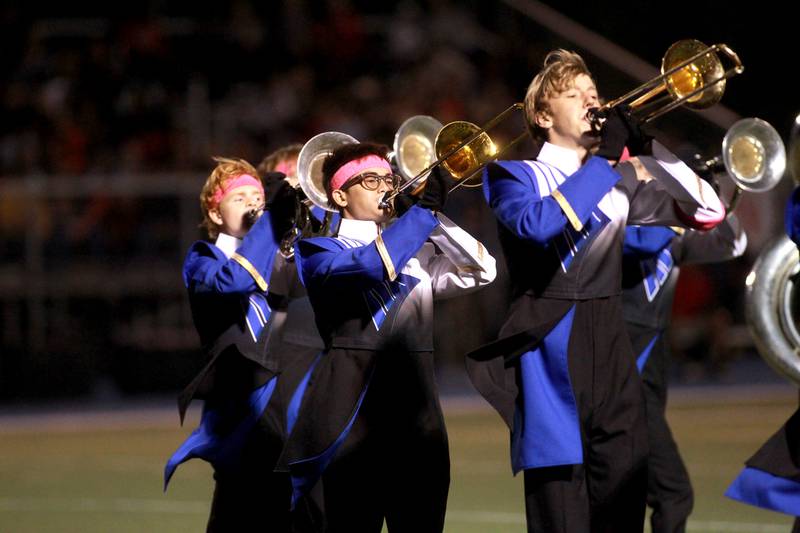The Wheaton North Marching Band performs during halftime during a game against Batavia on Friday, Sept. 27, 2024 at Wheaton North.