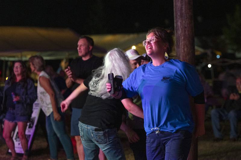 People dance and have fun listening to the closing band Saturday, Sept. 20, 2025, at Walton Fest.