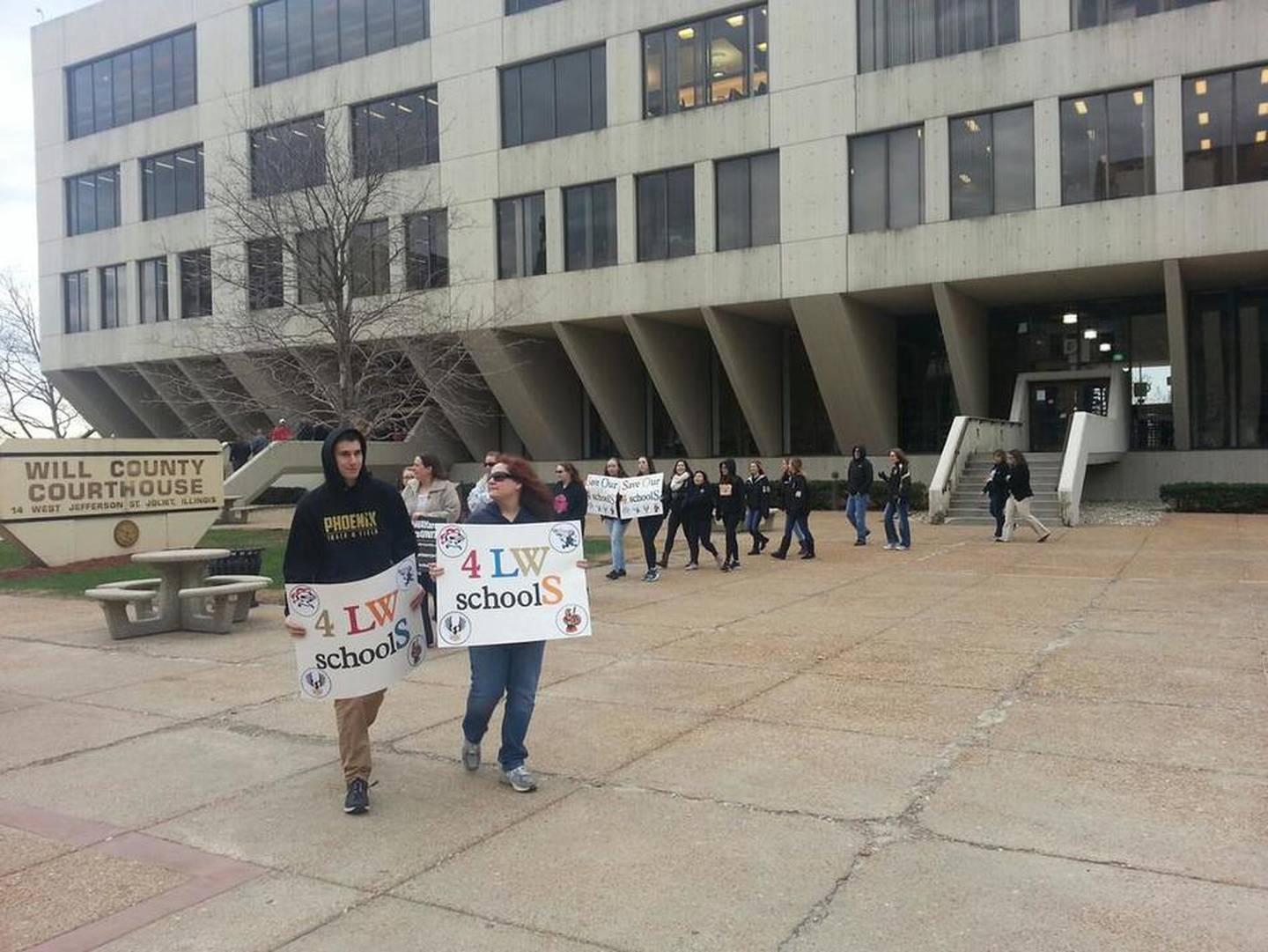 Lincoln-Way Area Taxpayers Unite rally Wednesday in front of the Will County Courthouse before a court appearance.