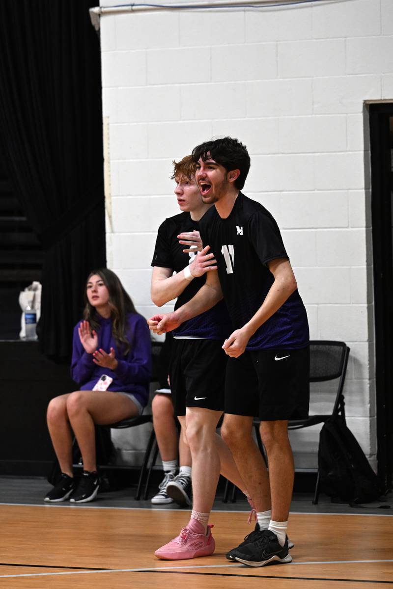 Manteno's Cody Hall and Maverick Kenney cheer on their teammates during the game against Kankakee Trinty Academy on Thursday, May 1, 2025.