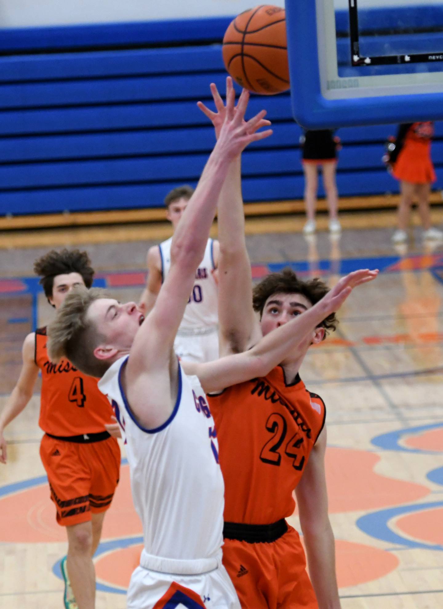 Eastland's Trevor Janssen (11) shoots as Milledgeville's Colton Hendick (24) looks to block during 1A regional action in Lanark on Saturday.