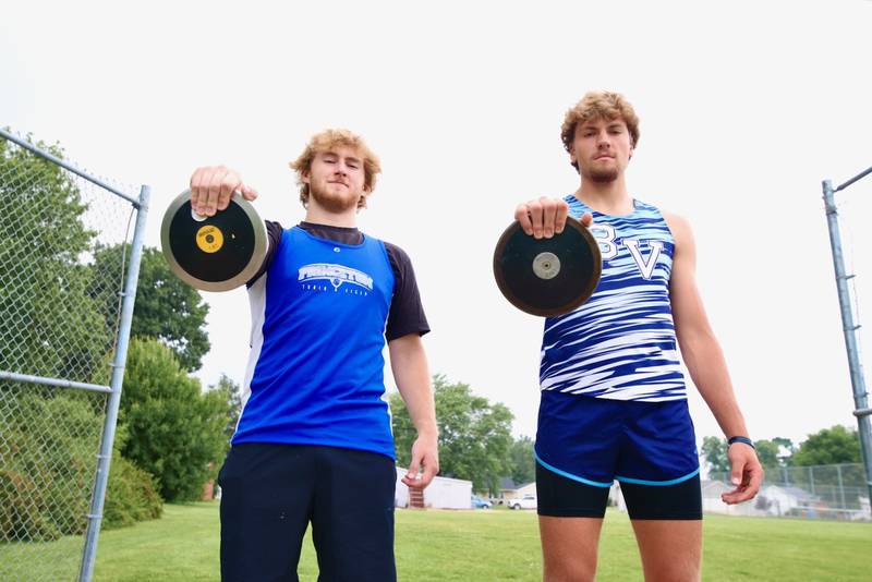 Princeton's Ian Morris (left) and Bureau Valley's Landon Hulsing brought home two state championships in the discus to Bureau County. Morris won the 2A title while Hulsing set a school record to win the 1A crown.
