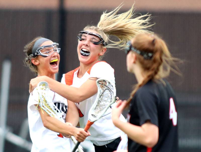 Crystal Lake Central United’s Addie Bechler, left, and Makayla Simonic celebrate a goal against Huntley in IHSA Sectional Title Game action at Crystal Lake Central High School in Crystal Lake on Friday, May 30, 2025.