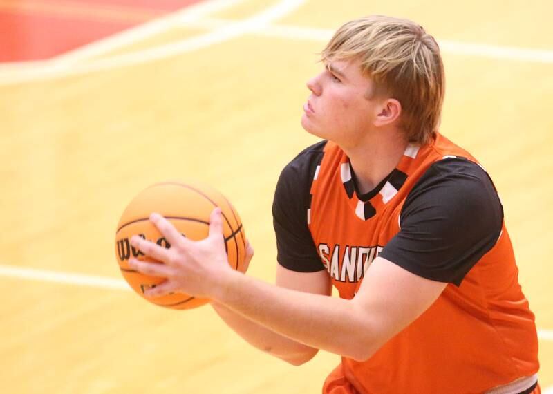 Sandwich's Noah Campbell looks to shoot a jump shot against Ottawa on Wednesday, Dec. 4, 2024 in Kingman Gym at Ottawa High School.