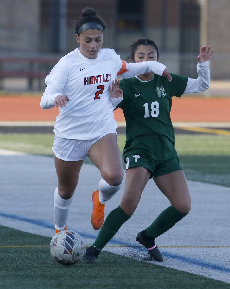 Huntley's Gabi Farraj controls the ball in front of Boylan Catholic's Leilani Gomez during a nonconference soccer game on Wednesday, March 27, 2024, at Huntley High School.