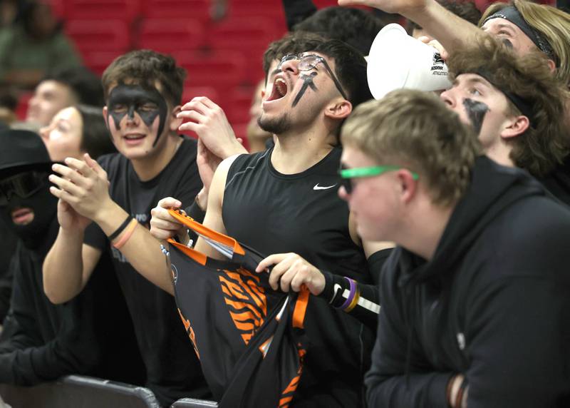 DeKalb fans cheer on their team during their game against Sycamore Friday, Jan. 31, 2025, in the FNBO Challenge in the Convocation Center at Northern Illinois University in DeKalb.