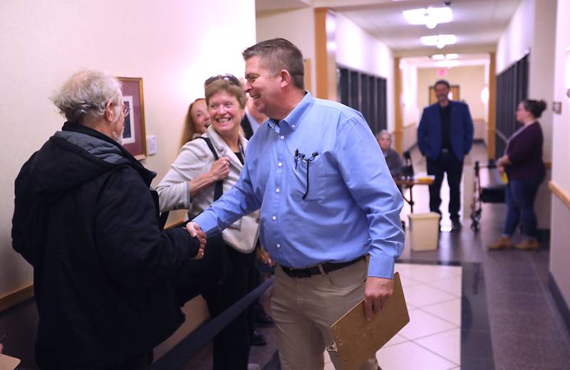 McHenry County Board member Mike "Shorty" Shorten (right) greets Kirk Donald, vice chair of the McHenry County Republican Party, on Monday, Oct. 27, 2025, while both file paperwork to run for precinct committeeman seats in the Spring 2026 primary election, at the McHenry County Clerk's Office in Woodstock.