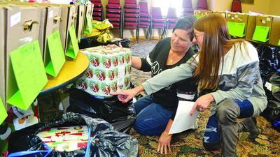 Making ready the Christmas baskets