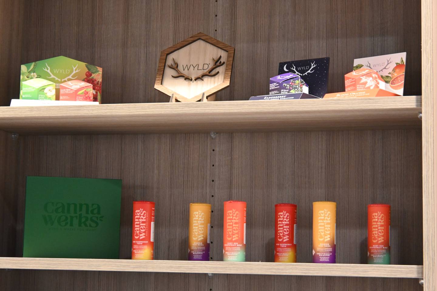 Multiple products line the wall of Peru's new dispensary Stash is located at 1320 E. 38th St.