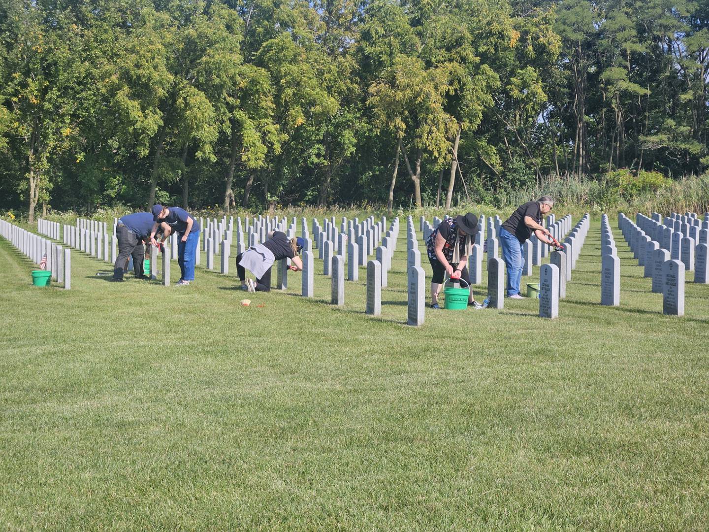 On Sept. 11, NuMark Credit Union joined community members at Abraham Lincoln National Cemetery for a gravestone cleaning event in honor of Patriots’ Day.