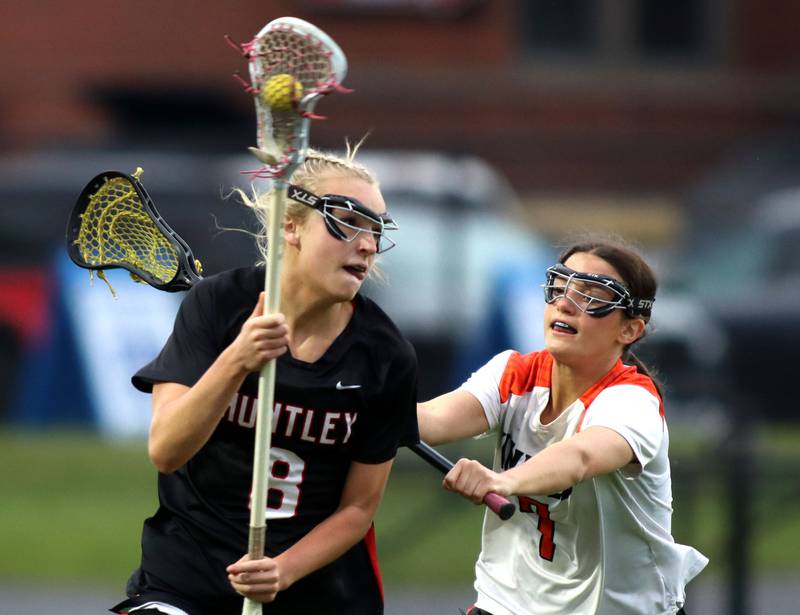 Crystal Lake Central United’s Adaline Arliskas, back,  battles Huntley’s Lauren Cardinal in IHSA Sectional Title Game action at Crystal Lake Central High School in Crystal Lake on Friday, May 30, 2025.