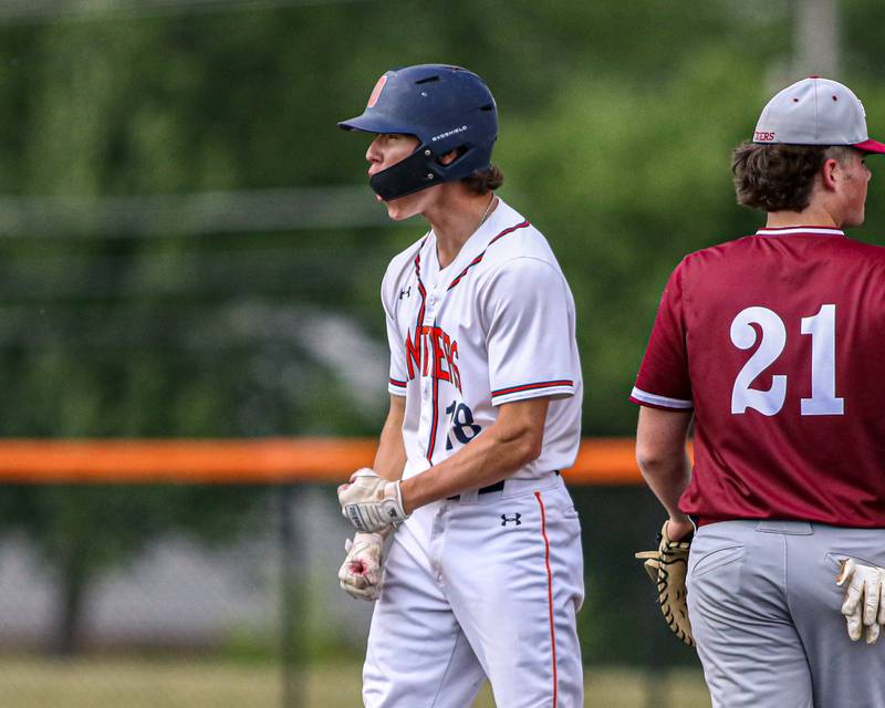 Oswego's Troy Vosburgh (18) yells to the dugout after sliding into second during Class 4A Romeoville Sectional semifinal game between Plainfield North at Oswego.  June 1, 2023.