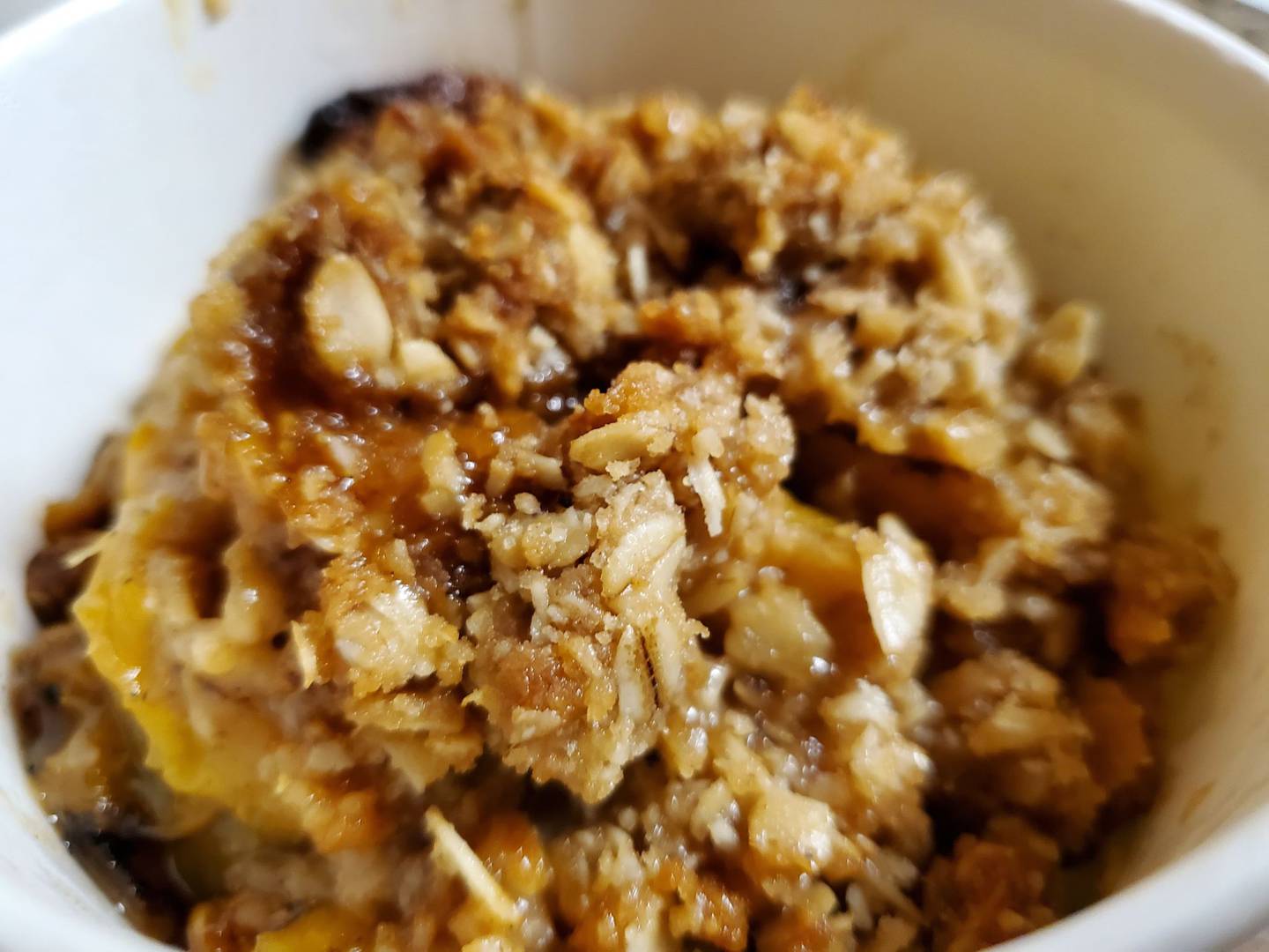 This sweet peach crisp with grill marks on the peaches makes a sweet finish to any meal at Station One Smokehouse in Plainfield.