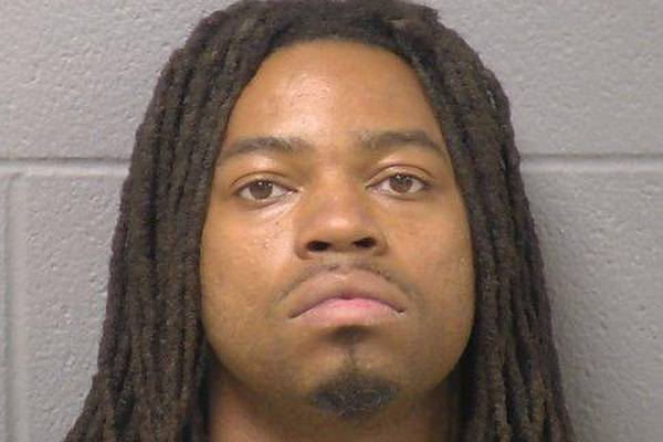 Joliet police: Officers find cocaine, heroin and guns at residence