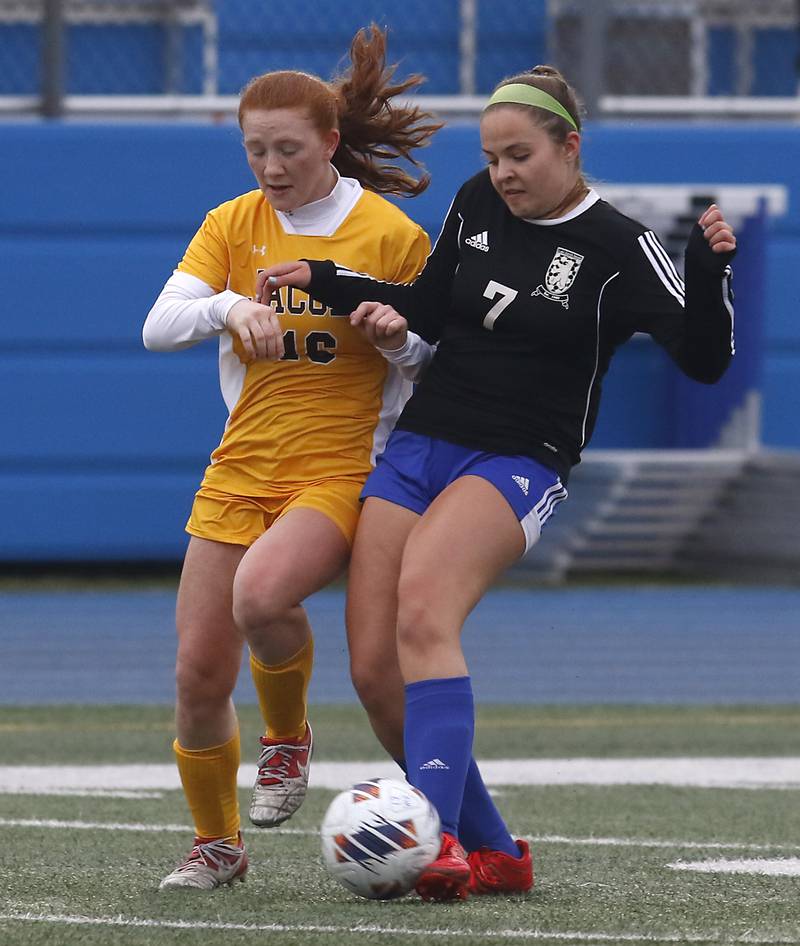 Jacobs' Delaney Lukowski battles with Lake Zurich’s Delilah Swartwood for the ball during a nonconference girls soccer match Tuesday, April 4, 2023, at Lake Zurich High School.
