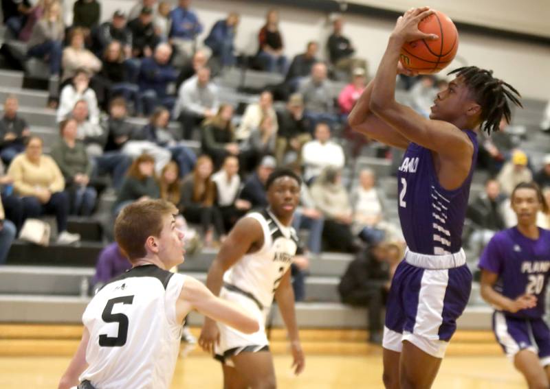 Plano’s AJ Johnson shoots the ball during a game at Kaneland in Maple Park on Tuesday, Dec. 20, 2022.