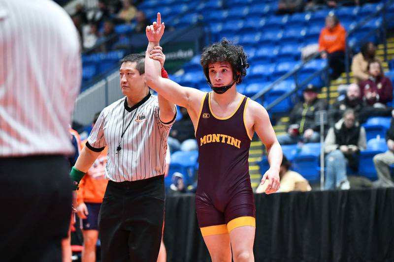 Isaac Mayora of Montini wins his 132-pound match over Niko Truax of Mahomet-Seymour during the IHSA Dual Team State Finals in Bloomington on Saturday, March 1.