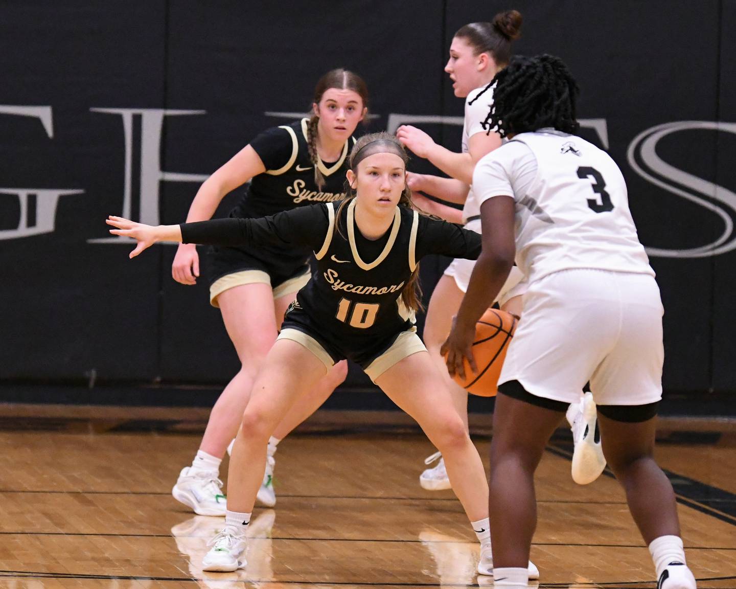 Sycamore's Cortni Kruizenga (10) plays some defense against Kaneland's Amani Meeks (3) during the game on Wednesday Feb. 4, 2026, held at Kaneland High School.