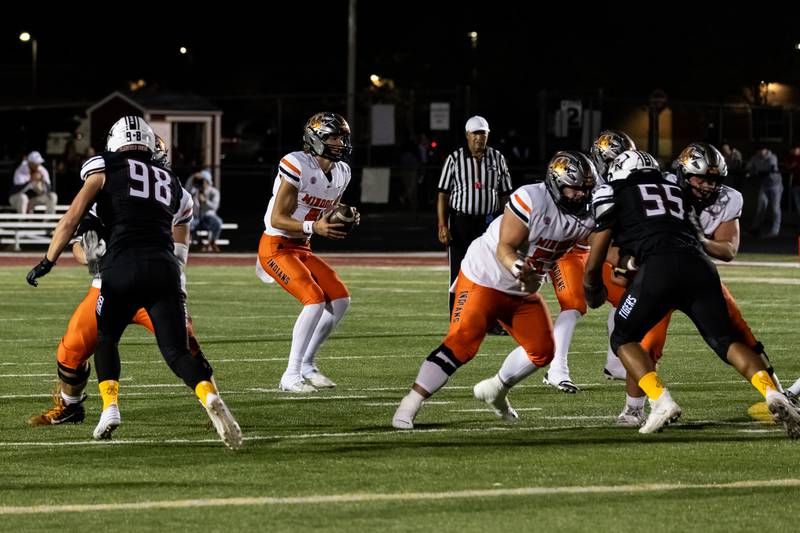 Minooka's Zane Caves prepares to pass during the Oct. 11 game against Plainfield North.