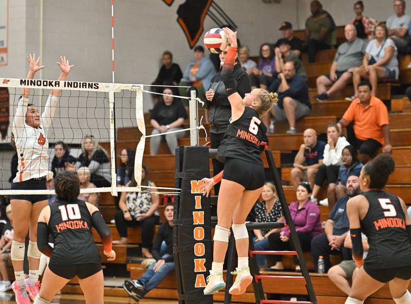 Minooka's Kendall Kozak attempts a kill shot during a conference game against Romeoville on Tuesday, Oct. 03, 2023, at Minooka. (Dean Reid for Shaw Local News Network)
