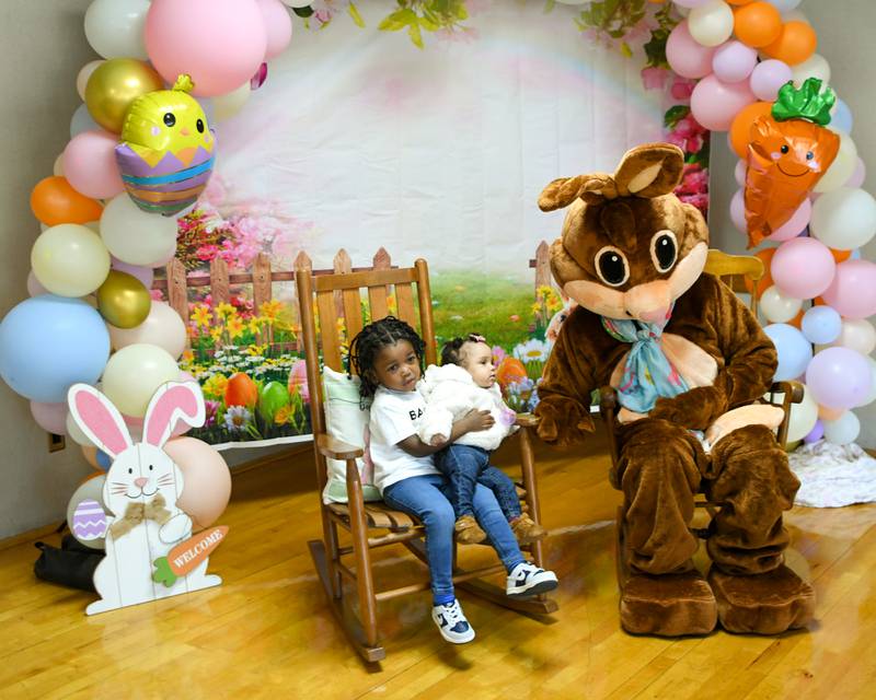 Sivaun Walker, 2, holds her sister Jelani Walker, 5 months, of DeKalb during the DeKalb Park District's annual Breakfast with the Bunny on Saturday, March, 23, 2024, held at Hopkins Park, 1403 Sycamore Road in DeKalb.
