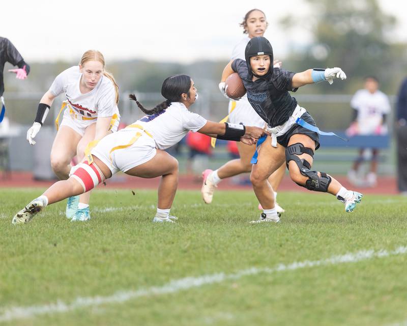 Willowbrook's Lily Macias tries to avoid West Aurora's Sarahi Carlos at the Sectional Final on Tuesday, Oct. 14,2025 in South Elgin.