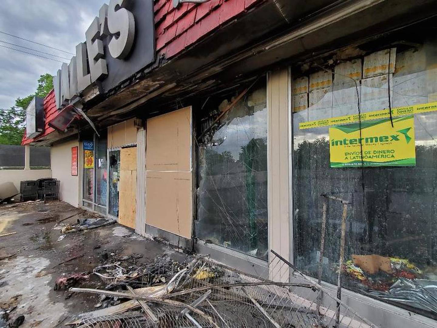 Joliet firefighters were called to put out the fire set by looters at the Valle's grocery store on West Jefferson Street during rioting on May 31. Interim City Manager Steve Jones this week said overtime costs for that night and measures taken to prevent looting in the following days totaled $500,000.