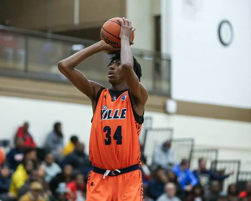 Romeoville's Adam Walker (34) shoots a free throw in the WJOL Tournament Championship game. Nov 25, 2023.