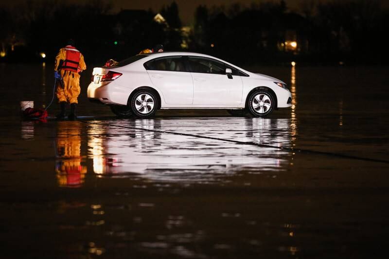 A woman was rescued Thursday, Dec. 29, 2022, after she drove her car out onto the frozen lake in Lakewood, police said in a news release on Saturday.