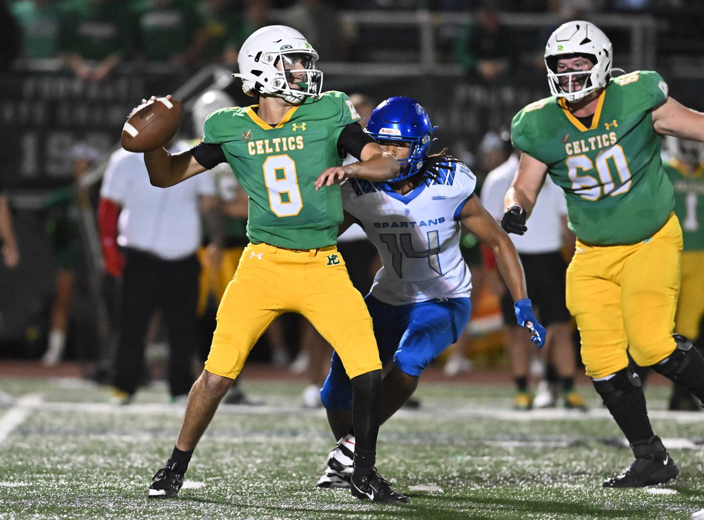 Providence Catholic's Tyler Payne (8) looks to pass the ball during the non-conference game against St. Francis on Friday, SEP. 26, 2025, at New Lenox.