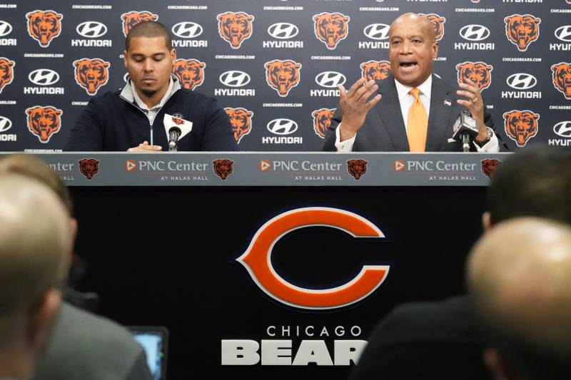 Chicago Bears President and CEO Kevin Warren, right, speaks as General Manager Ryan Poles listens during an NFL football news conference at Halas Hall in Lake Forest, Ill., Monday, Dec. 2, 2024. (AP Photo/Nam Y. Huh)