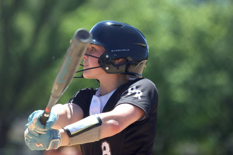 Prairie Ridge’s Ady Kiddy checks in to bat against Harvard during Class 3A softball regional final action at Lions Park in Harvard Saturday.